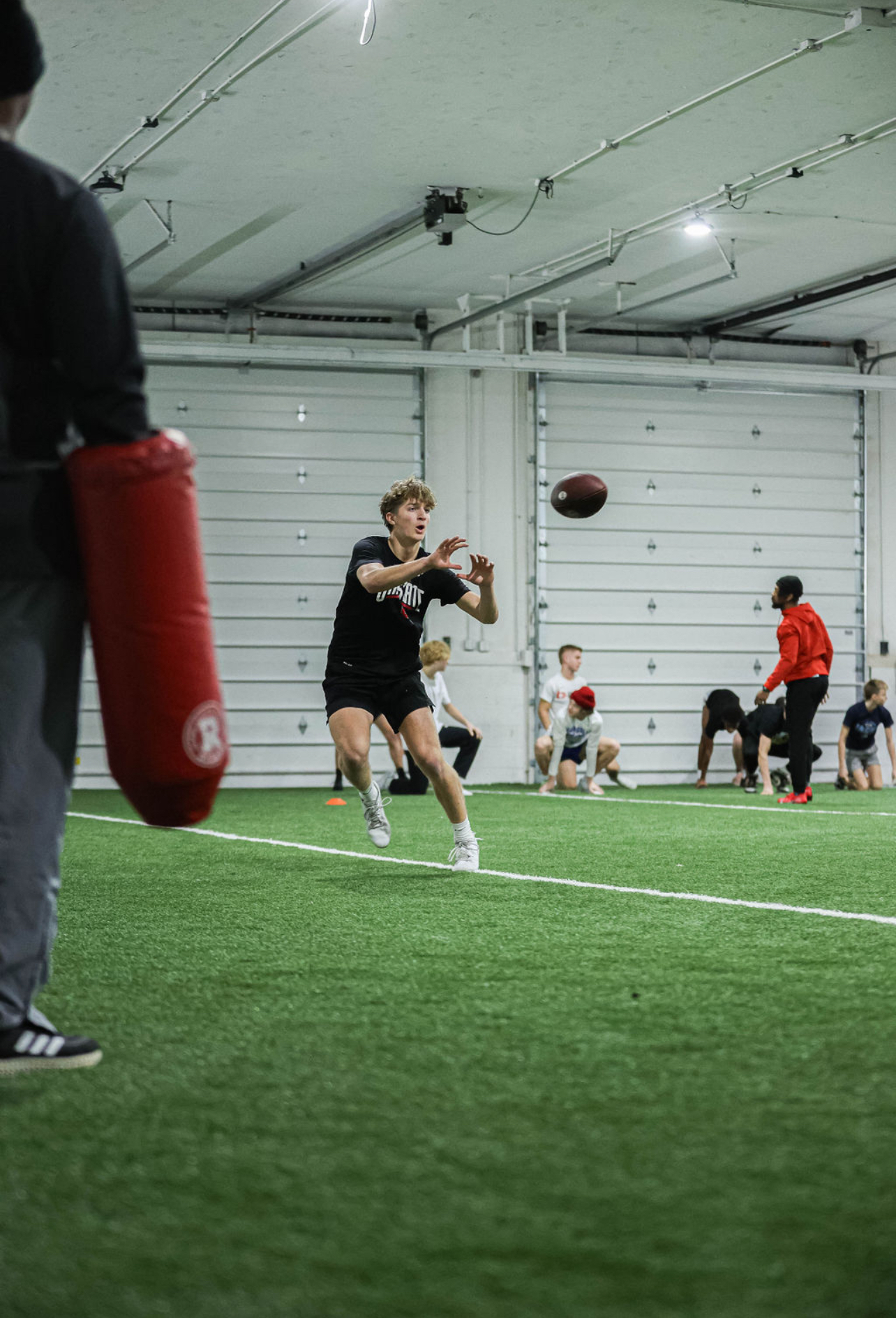 Athletes training together in a development session